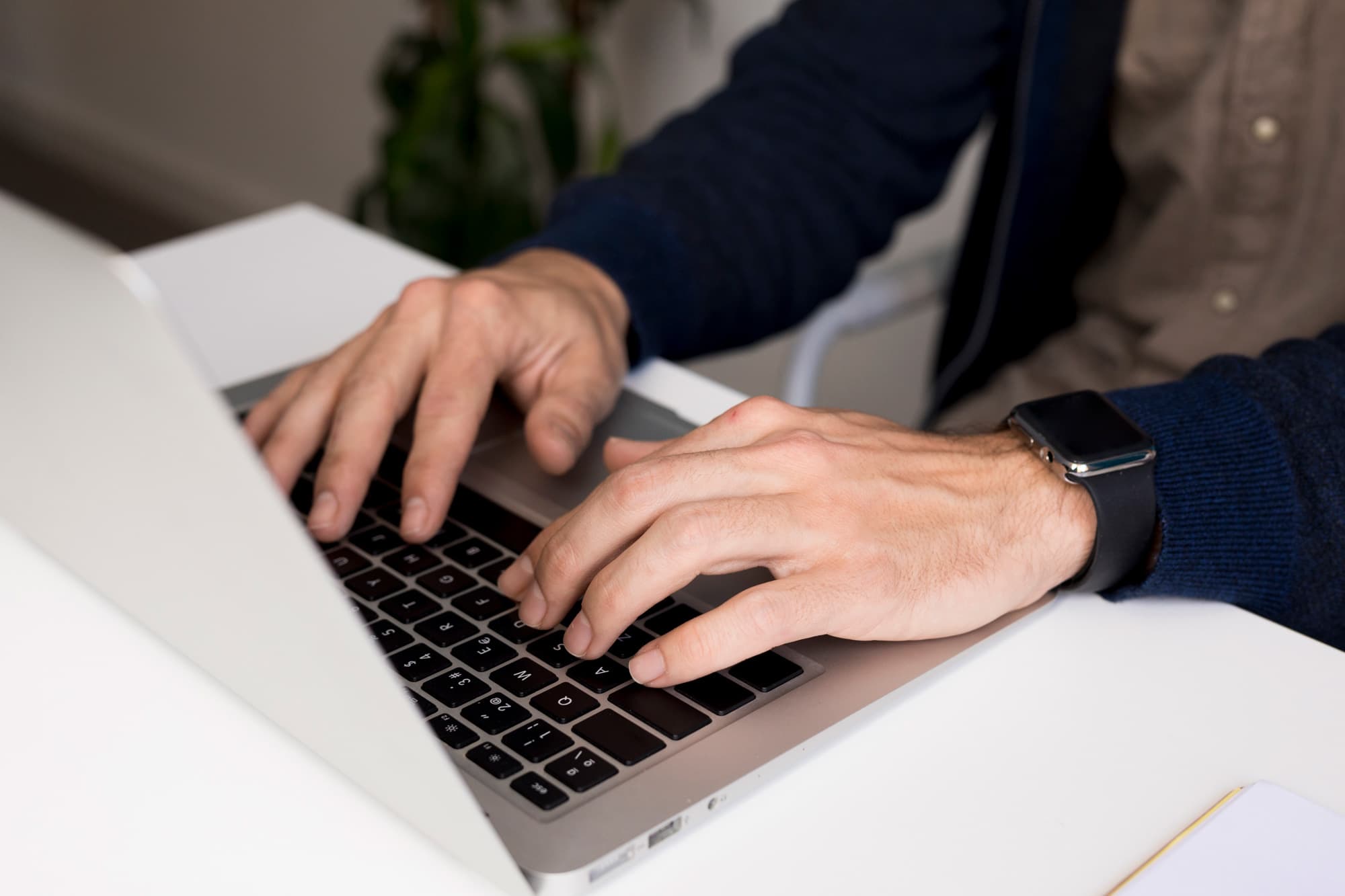 individual working on laptop